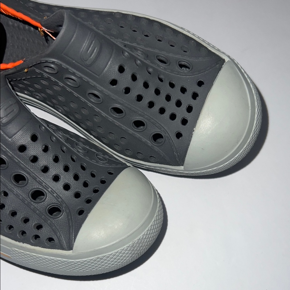 Skechers Kids Black and Orange Slip-On Sneakers - Picture 7 of 10